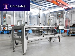 Automatic shrink wrapping machine for canscontinuous