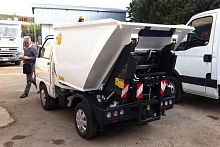 Top-loader waste collection vehicle