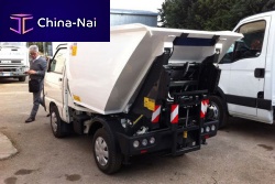 Top-loader waste collection vehicle