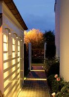 Contemporary wall light COURBES OUT : UNOgardenstainless steelLED