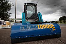 Skid steer loader sweeper hydraulic motor