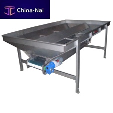 Reception hopper for carrotsinclinedwith belt conveyor