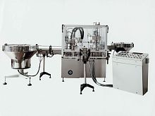 Automatic filling and capping machine bottle