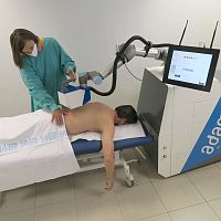 Collaborative robotic arm ADAMOair compression massagefor muskuloskeletal disorders treatment
