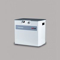 Laboratory air compressor on castersoil-free