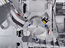Bottle feeding system for production linesfor packaging machines