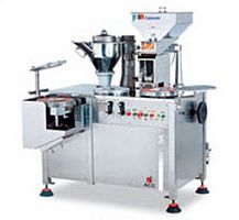 Semi-automatic filling machine multi-containercapsulesolids