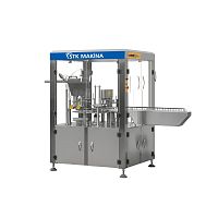 Container filling machine for dairy productsfor the food industry