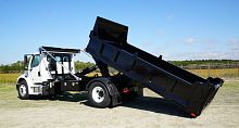 Tractor-mounted loader for hazardous environmentsfor lorries