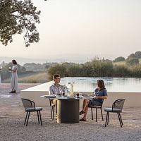 Contemporary dining table BRANTAceramicstainless steel baseround