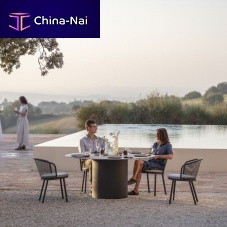 Contemporary dining table BRANTAceramicstainless steel baseround