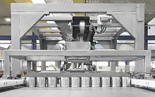 Top-loading case packer-unpacker for metalvacuumfor glass containers