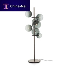 Floor-standing lamp Bolle Stelobrasslacquered metalblown glass