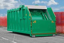 Stationary waste compactor top-loading