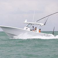 Outboard center console boat 368 COMMANDERtriple-enginesport-fishingwith cabin
