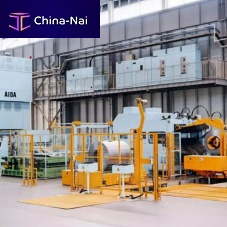 Coil feeding line for the automotive industry