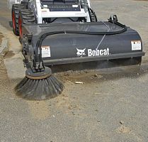 Skid steer loader sweeper hydraulic