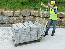 Adjustable hand truck for paving stones