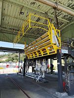 Folding access gangway for tanks