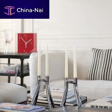Aluminum candle holder ABBRACCIAIOby Philippe Starck
