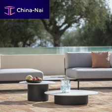 Contemporary coffee table BRANTAceramicstainless steel baseround