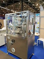 Bottle top filler and capper UNICADOSE®monoblocvacuumpneumatic