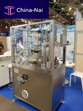 Bottle top filler and capper UNICADOSE®monoblocvacuumpneumatic