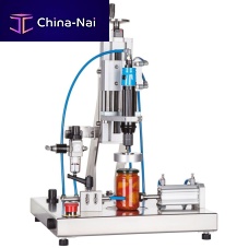 Pneumatic capping machine semi-automaticfor glass containersfor twist-off caps