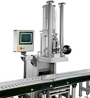 Solids filling machine vibratory weighing