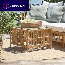 Contemporary side table Carolineglassaluminum baserattan base
