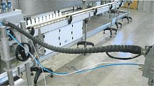 Dosing heated hose for cosmetic products