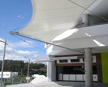 Wire mesh-and-cable tensile structure for entrance canopywith PVC membrane