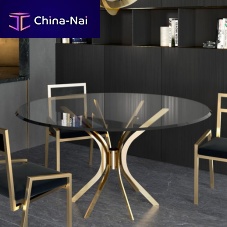 Contemporary table HARINGbrassbrass baseround