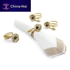 Brass napkin ring ANEMONE for domestic use