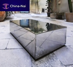 Contemporary coffee table Monolithpolished stainless steelstainless steel baserectangular