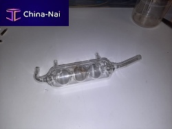 Glass condenser cooled