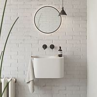 Wall-mounted hand basin P'TITovalSolid Surface