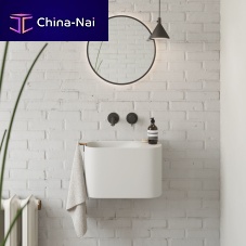 Wall-mounted hand basin P'TITovalSolid Surface