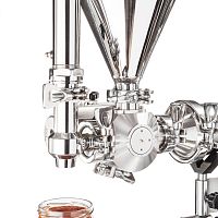 Volumetric dispensing valve