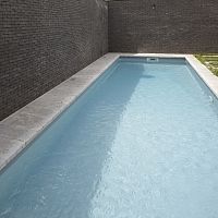Natural stone swimming pool coping AUBEROCHE MANGANESEcorner