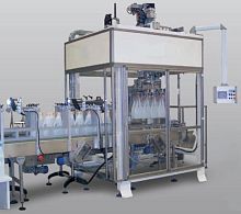 Horizontal case packer for bottlescartonPLC-controlled