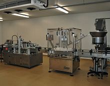 Fruit juice filler-capper-labeler PLC-controlledautomaticfor the food industry