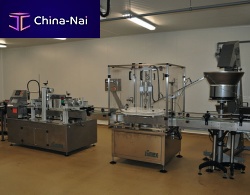 Fruit juice filler-capper-labeler PLC-controlledautomaticfor the food industry