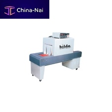 Semi-automatic shrink wrapping machine for bottles